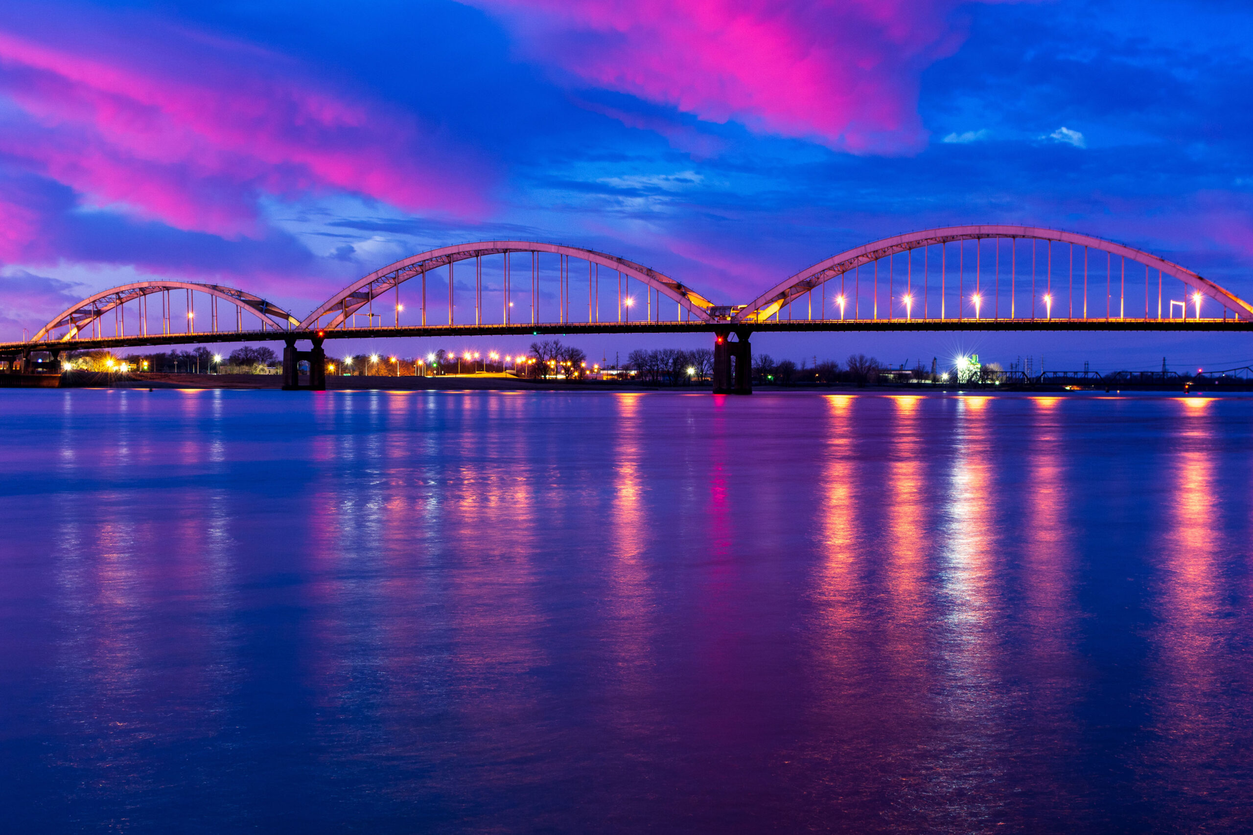 Centennial Bridge over Mississippi River connecting Rock Island, Illinois and Davenport, Iowa during the morning blue hour